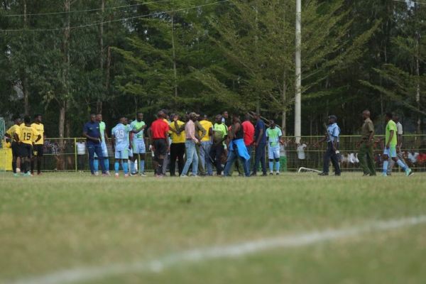 Fans invading the pitch in the Muhoroni Youth vs KCB clash. PHOTO| KCB