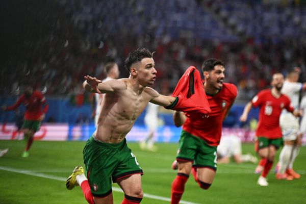 Portugal's forward #26 Francisco Conceicao (L) celebrates with teammates after scoring his team's second goal against Czech. PHOTO| AFP